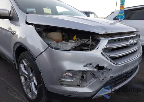 2017 Ford Escape Titanium z USA, uszkodzony, nr VIN 1FMCU0J94HUC80309